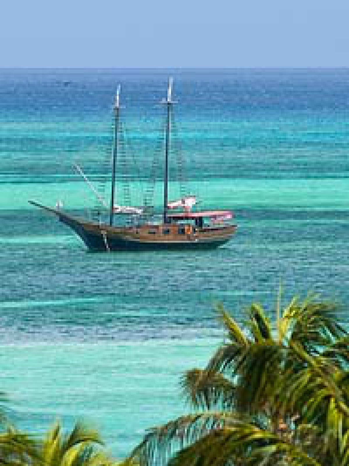 a small boat in a body of water