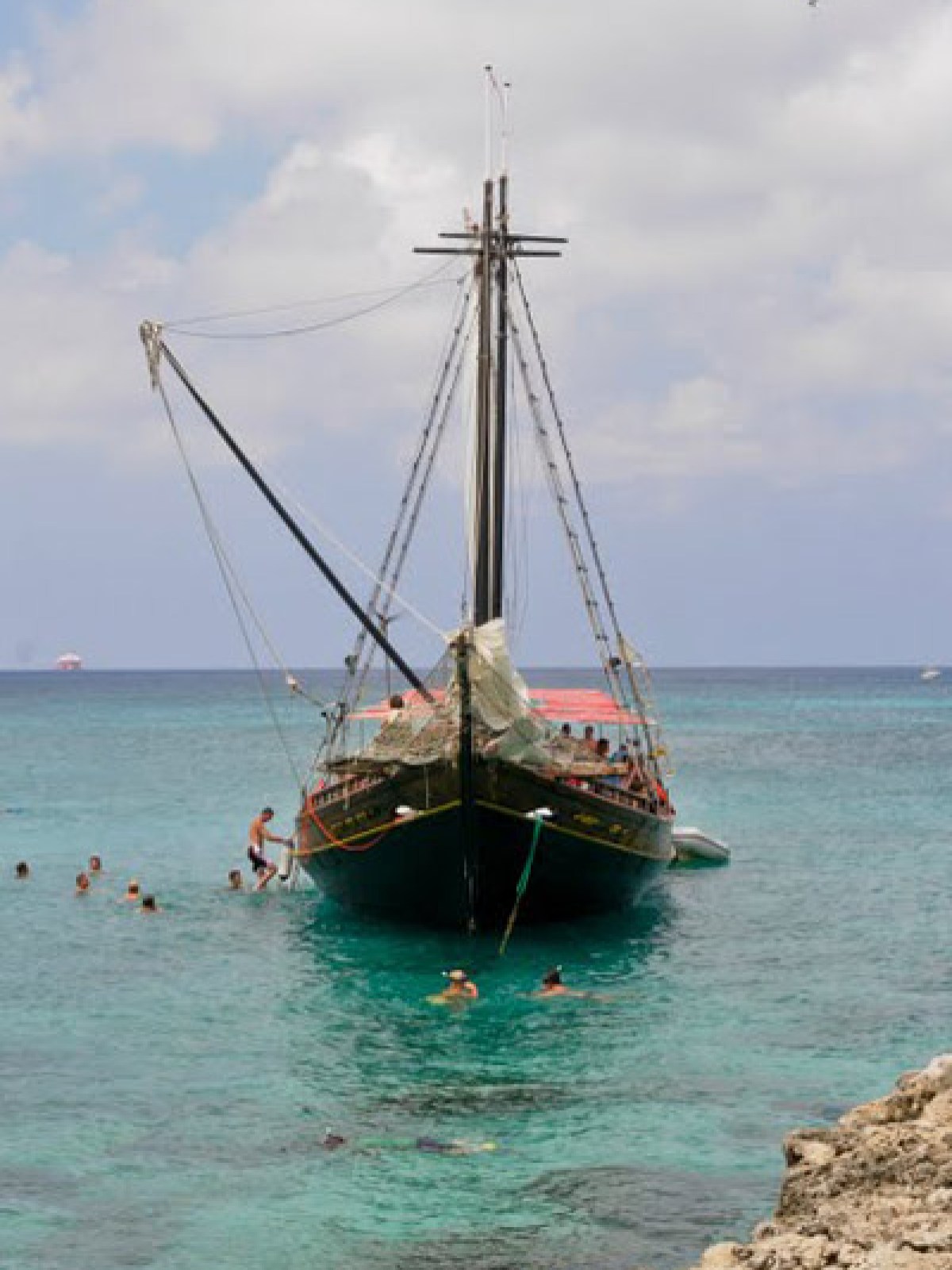 a small boat in a body of water