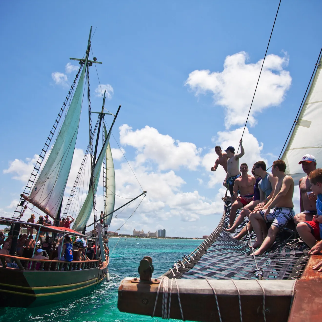 a group of people on a boat in the water