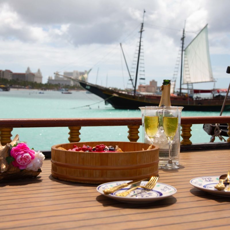 a boat is docked next to a body of water
