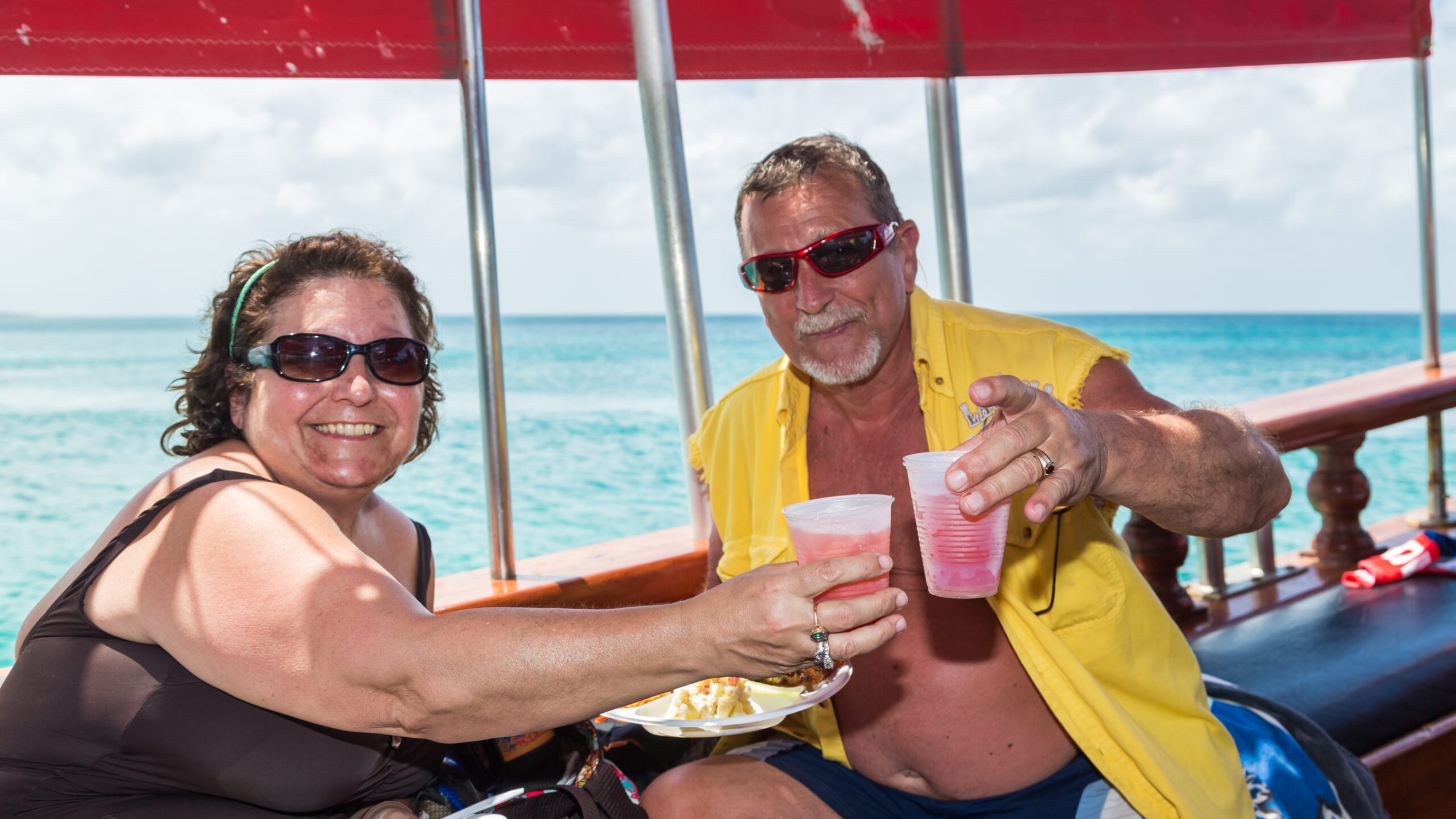 a couple of people that are sitting on a boat