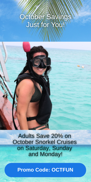 Woman in snorkel gear on a boat with ocean view and discount text for October snorkel cruises.