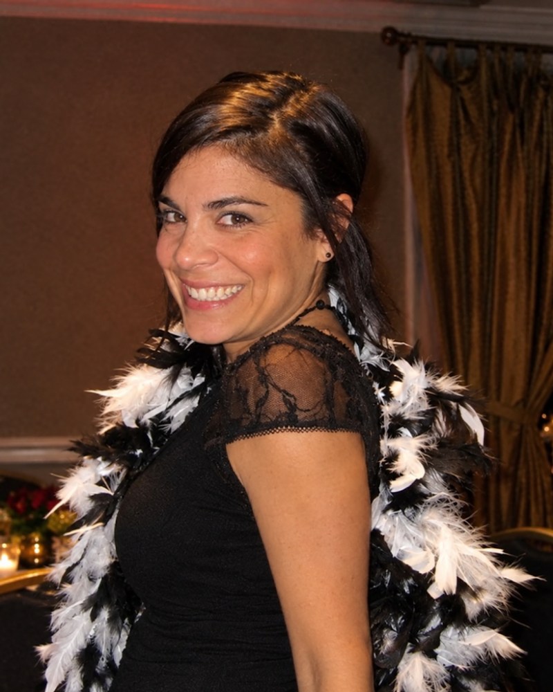 Cousin Rachael smiling for a photograph.